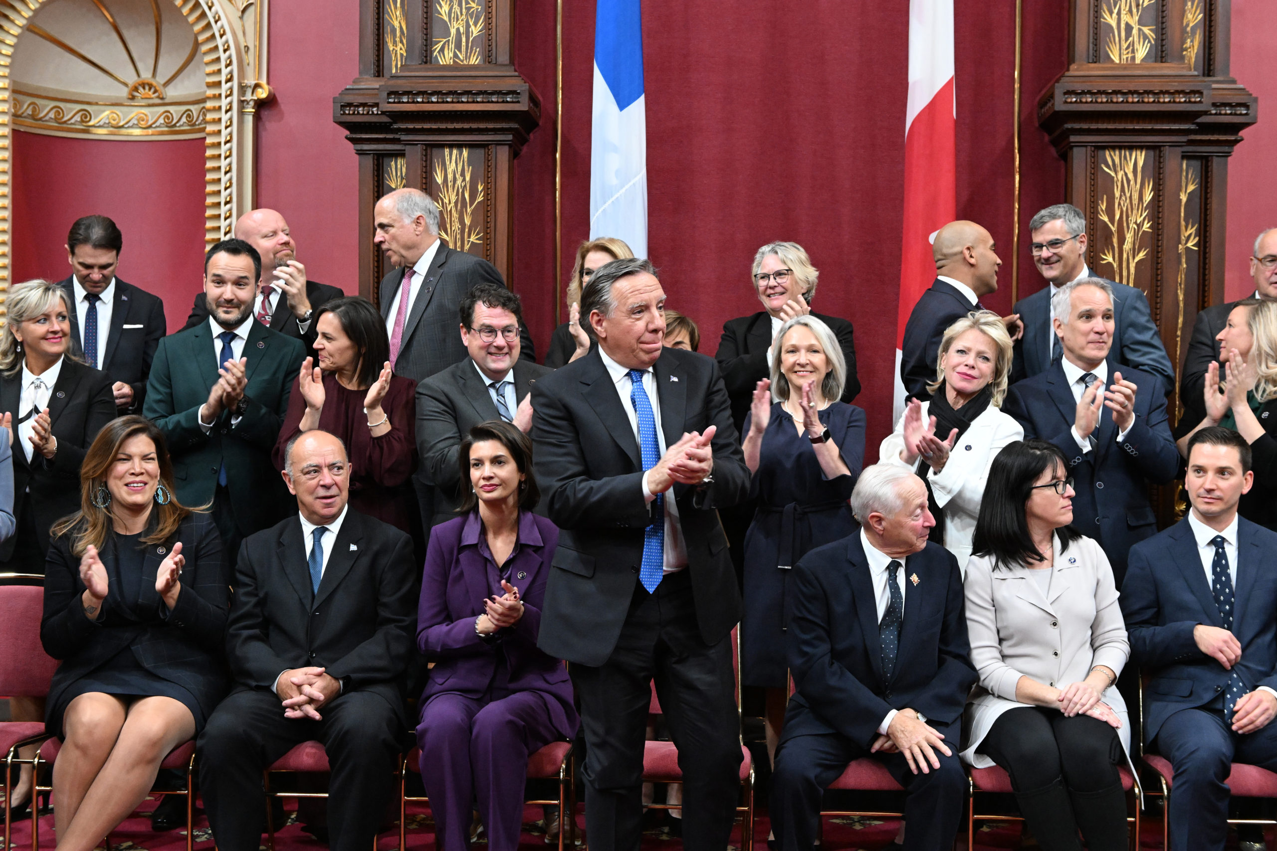 Francois Legault applauds his new cabinet