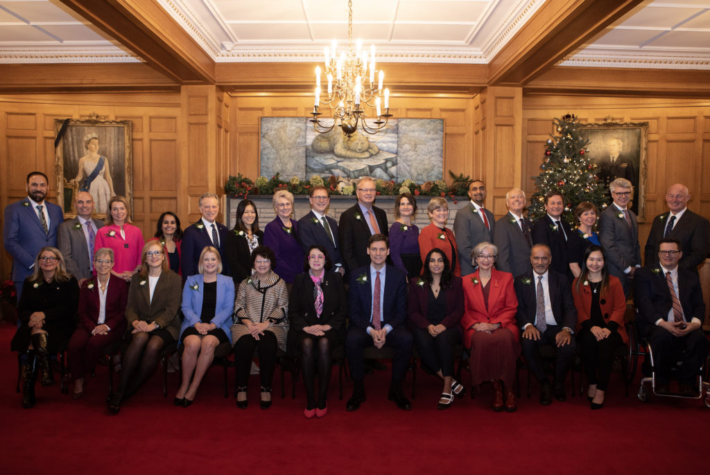Ministers pose for a family portrait
