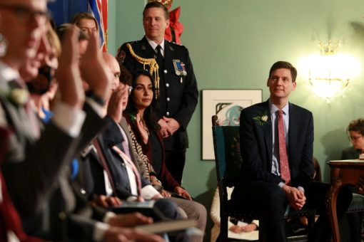 Premier David Eby looks on as ministers are sworn in