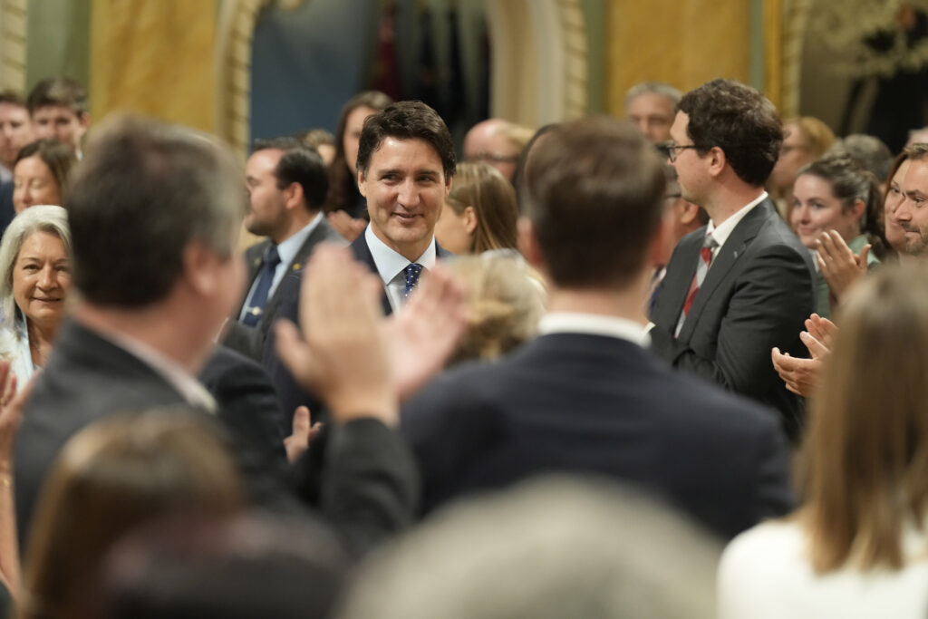 Prime Minister Justin Trudeau is applauded at a cabinet swearing-in ceremony at Rideau Hall in Ottawa on Wednesday, July 26, 2023.